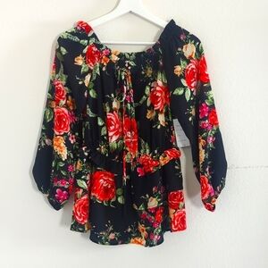 Andrew by Unit beautiful floral top.